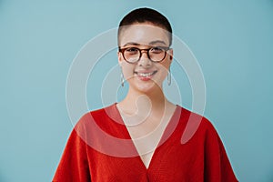 Young woman wearing eyeglasses smiling and looking at camera