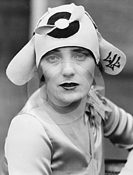 Young woman wearing a fashionable hat