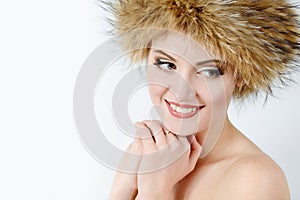 Young woman wearing fur har