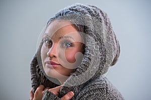 Young woman wearing hoodie in frost