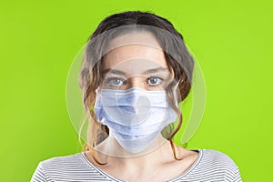 Young woman wearing hygienic mask to prevent infection coronavirus