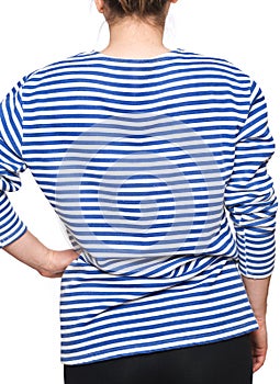 Young woman is wearing long sleeved telnyashka russian navy striped shirt