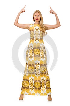 The young woman wearing long summer dress isolated