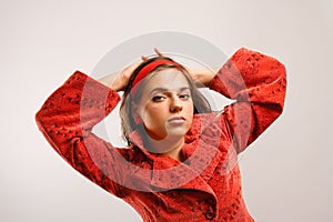 Young woman wearing red jacket