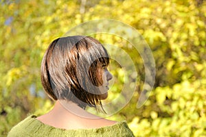 Young woman wearing short bob hairstyle.