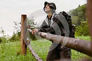 Young woman wearing trekking equipment hiking in mountains