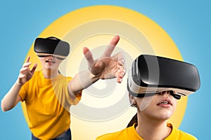 A young woman wearing virtual reality glasses, holding out her hands and a close-up portrait. Blue background with a yellow circle