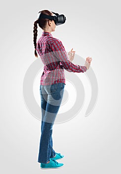 Young woman wearing VR goggles