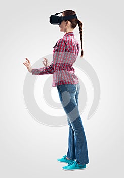 Young woman wearing VR goggles