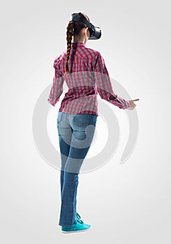 Young woman wearing VR goggles