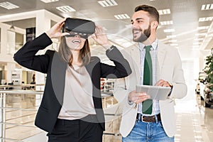 Young Woman Wearing VR Helmet