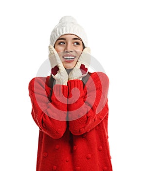 Young woman wearing warm clothes on white. Winter season