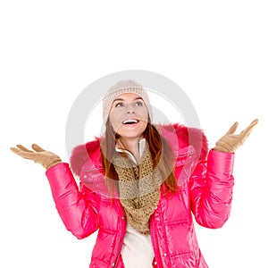 Young woman wearing winter jacket scarf and cap