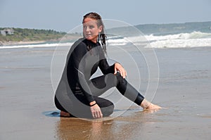 Young Woman in a Wetsuit at Beach