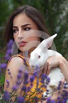 Young woman and white bunny