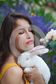 Young woman and white bunny