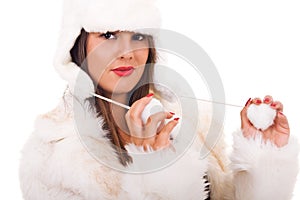 Young woman in white fur