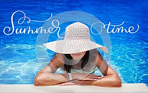 Young woman in white hat resting in pool and text Summer time. Calligraphy lettering hand draw