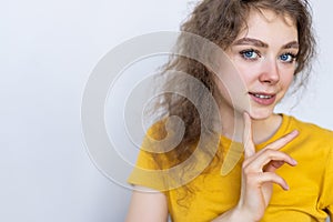 Young woman with white perfect smile looking at camera at home