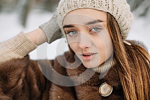 Young woman winter portrait. Shallow dof