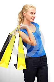 Young woman withl shoppingbags photo