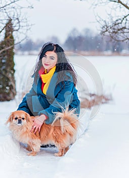 Young woman in wool  coat at winter day