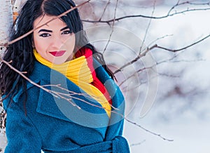 Young woman in wool  coat at winter day