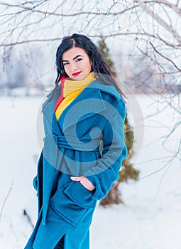 Young woman in wool  coat at winter day