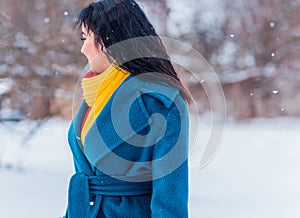 Young woman in wool  coat at winter day