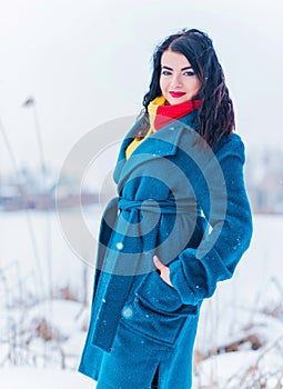 Young woman in wool  coat at winter day