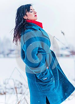 Young woman in wool  coat at winter day