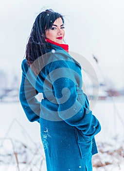 Young woman in wool  coat at winter day