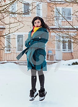 Young woman in wool  coat at winter day