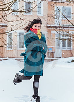 Young woman in wool  coat at winter day