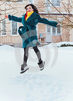 Young woman in wool  coat at winter day