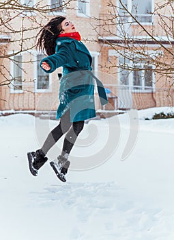 Young woman in wool  coat at winter day