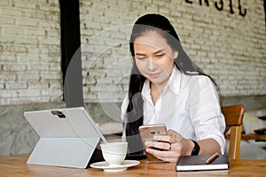 Young woman working it cafe