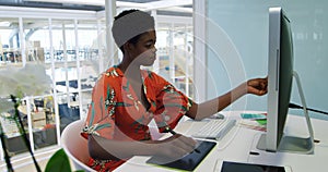 Young woman working in a creative office