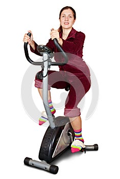 Young woman working out on exercycle