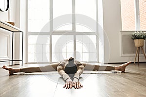 Young woman working out at home