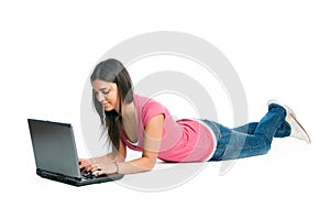 Young woman working and surfing on laptop