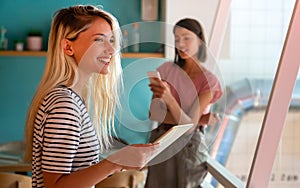 Young woman working with tablet in office. People digital device business education concept