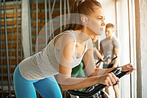 Young woman workout in gym.