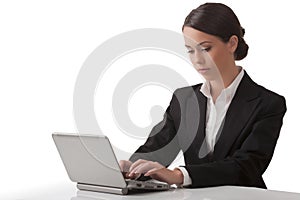 The young woman works on computer