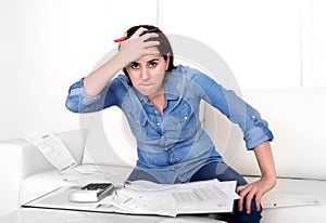 Young woman worried at home in stress accounting desperate in financial problems