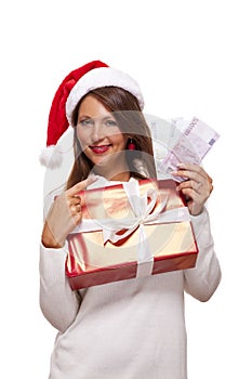 Young woman with an Xmas gift and money