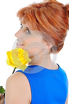 Young woman with a yellow rose.
