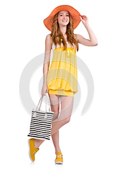 Young woman in yellow summer dress isolated on the