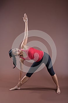 Young woman in yoga pose
