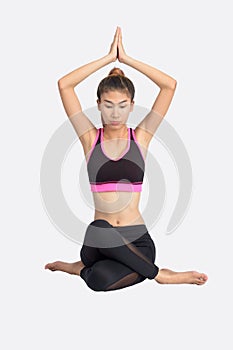 Young woman in yoga pose.